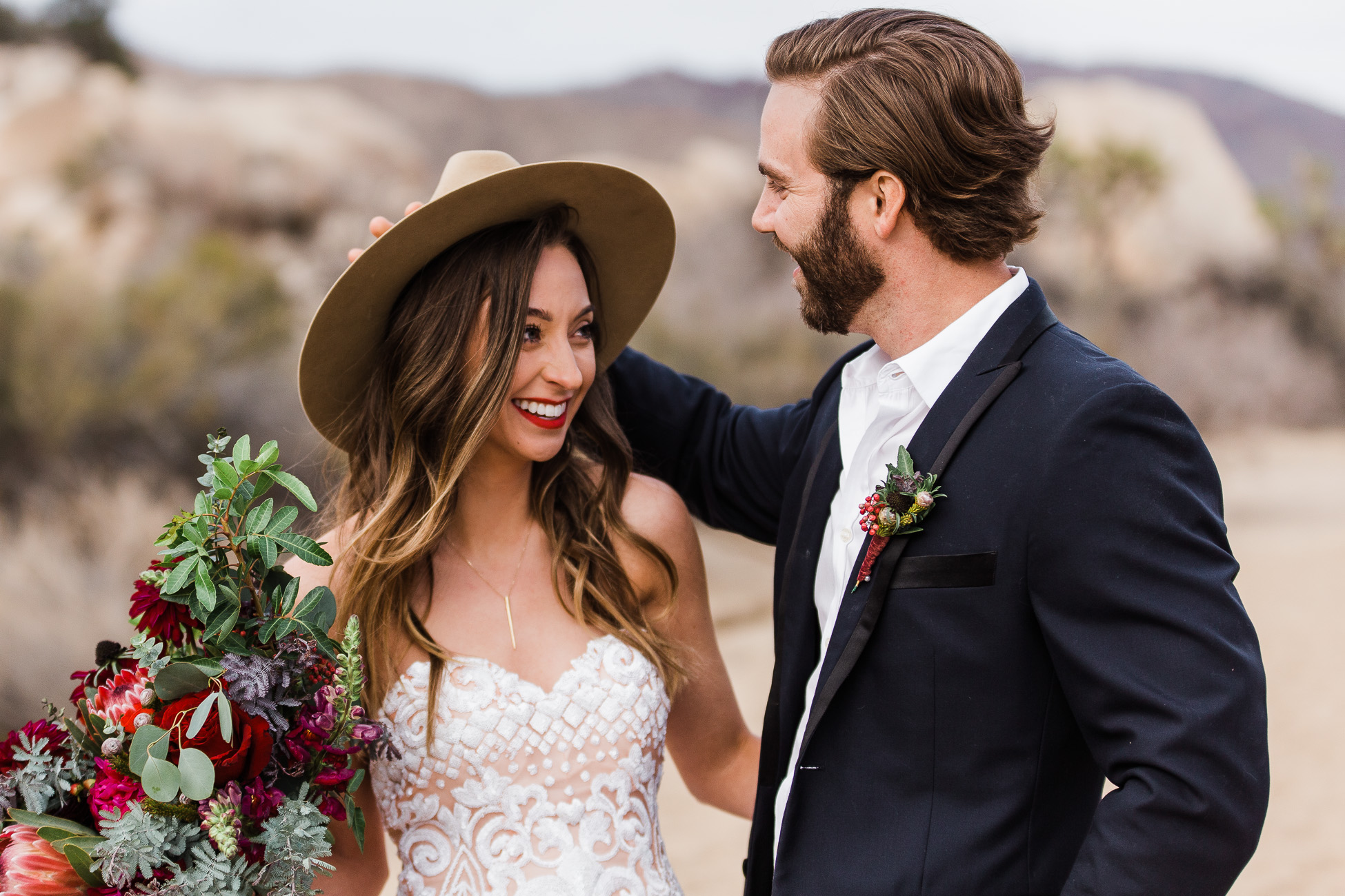 Bride and Groom smiling elopement wdding joshua tree national park